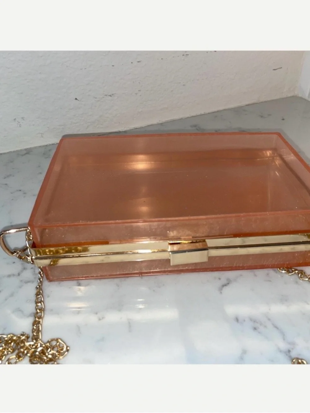 Peach Rose Gold Resin Clutch Handbag with a Gold Long Chain and Frame